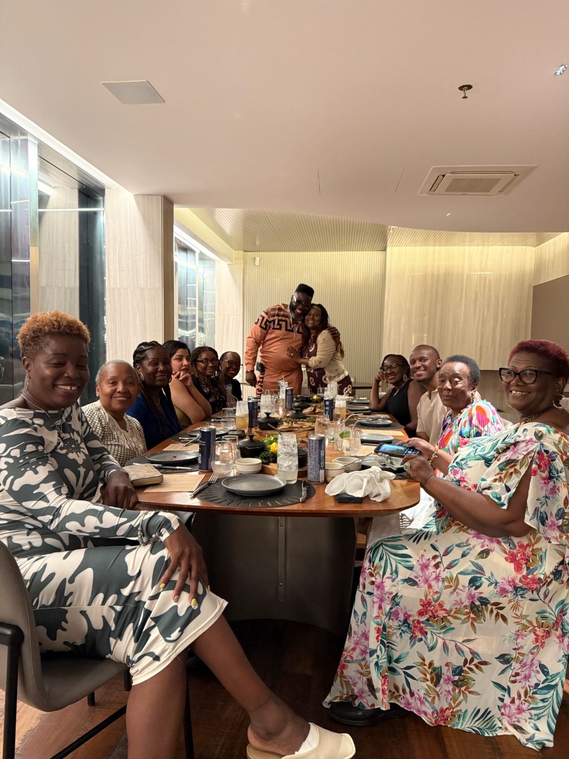 Travelers sharing dinner in Brazil